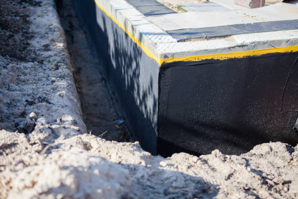 Professional Emergency Waterproofing technician working in Greenfield, OH